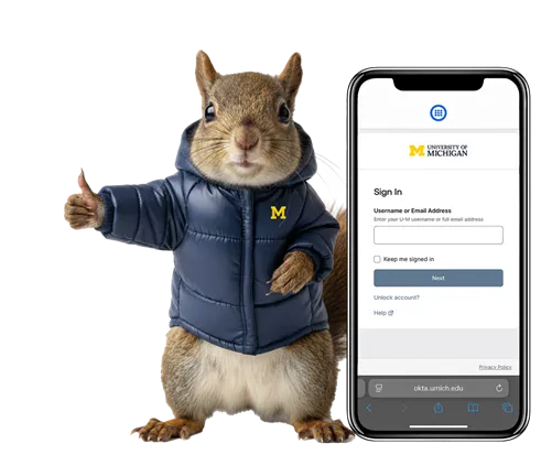 Squirrel giving thumbs up standing next to phone showing new Okta sign-in page