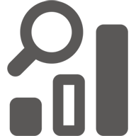 Magnifying glass above rising bar chart