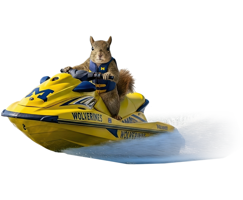A squirrel wearing a University of Michigan life vest rides a U-M Wolverines jetski.